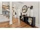 View of an elegant entryway with hardwood floors, a custom staircase, and modern decor at 4976 Concert Ln, Marietta, GA 30066