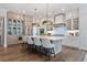 Spacious kitchen featuring an island with bar seating, stainless steel appliances, and custom cabinetry at 4976 Concert Ln, Marietta, GA 30066