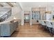Open-concept kitchen featuring a large island, hardwood floors, and modern cabinetry at 4976 Concert Ln, Marietta, GA 30066