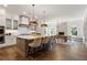 Bright, modern kitchen with an island, breakfast bar, and open dining area at 4976 Concert Ln, Marietta, GA 30066