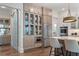 Well-equipped kitchen with stainless steel appliances and ample storage; bar area to the side at 4976 Concert Ln, Marietta, GA 30066