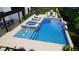 Swimming pool with integrated hot tub and small splash pool, outdoor kitchen, and dining area at 4976 Concert Ln, Marietta, GA 30066