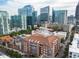 Aerial view showcasing building's rooftop details with skyline in the distance at 77 Peachtree Ne # 507, Atlanta, GA 30309