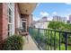 Cozy balcony featuring chairs and a table with city views at 77 Peachtree Ne # 507, Atlanta, GA 30309