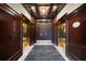 Luxurious elevators with wood-paneled exteriors and convenient button panels for easy floor access at 77 Peachtree Ne # 507, Atlanta, GA 30309
