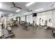 Well-equipped gym with various exercise machines, weights, and mirrored walls at 77 Peachtree Ne # 507, Atlanta, GA 30309