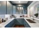 An open-concept kitchen featuring marble countertops and a breakfast bar at 77 Peachtree Ne # 507, Atlanta, GA 30309
