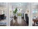 Bright open living room leading to an outside balcony with a view of city buildings at 77 Peachtree Ne # 507, Atlanta, GA 30309