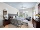 Spacious bedroom features a seating area, ceiling fan, and natural light at 77 Peachtree Ne # 507, Atlanta, GA 30309