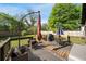 Inviting back deck featuring a dining table, a hot tub, a grill and comfortable seating; perfect for outdoor entertaining at 1168 Eggleston Sw St, Atlanta, GA 30310