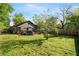 Lush backyard with mature trees, providing a serene and private outdoor space at 1168 Eggleston Sw St, Atlanta, GA 30310