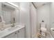 A well-lit bathroom with modern fixtures, a shower, and a neutral color scheme at 1168 Eggleston Sw St, Atlanta, GA 30310