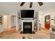 Elegant living room featuring a fireplace, built-in shelving, and an open layout at 1168 Eggleston Sw St, Atlanta, GA 30310
