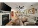 Spacious living room with a fireplace, natural light, and comfortable seating arrangement at 1168 Eggleston Sw St, Atlanta, GA 30310