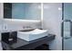 Bathroom featuring a modern sink, black countertop, and glass shower at 2161 Peachtree Ne Rd # 605, Atlanta, GA 30309