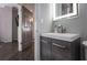 Bathroom featuring a modern sink and vanity with storage cabinets at 2161 Peachtree Ne Rd # 605, Atlanta, GA 30309