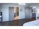 This bedroom offers two doorways and hardwood floors at 2161 Peachtree Ne Rd # 605, Atlanta, GA 30309