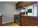 Kitchen highlighting stainless steel oven, range hood, modern cabinets and white countertop at 2161 Peachtree Ne Rd # 605, Atlanta, GA 30309