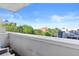 Balcony with a view of lush trees and a building at 3040 Peachtree Nw Rd # 511, Atlanta, GA 30305