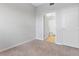 Bedroom showing a neutral color scheme with access to an ensuite bathroom and closet at 3040 Peachtree Nw Rd # 511, Atlanta, GA 30305