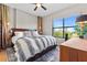Comfortable bedroom with a large window, soft bedding, and warm lighting, creating a relaxing retreat at 3040 Peachtree Nw Rd # 511, Atlanta, GA 30305