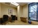 Functional business center includes computers, desks, and a printer for residents' work and study needs at 3040 Peachtree Nw Rd # 511, Atlanta, GA 30305
