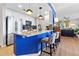 Modern kitchen boasts white cabinets, stainless steel appliances, and granite countertops at 3040 Peachtree Nw Rd # 511, Atlanta, GA 30305