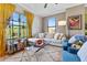 Inviting living room featuring plush seating, natural light, and stylish decor, creating a cozy and comfortable atmosphere at 3040 Peachtree Nw Rd # 511, Atlanta, GA 30305