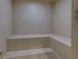 Relaxing tiled steam room with built in seating, providing a spa-like experience within the comfort of home at 3040 Peachtree Nw Rd # 511, Atlanta, GA 30305