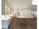 Well-designed kitchen featuring a center island, stainless steel appliances, and ample counter space at 6565 Rhett Run, Cumming, GA 30028