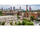 Beautiful aerial view of the community and city skyline, with lush green trees and landscaping at 170 Boulevard Se # E006, Atlanta, GA 30312