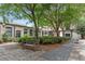 Relaxing courtyard with lush landscaping, a stone walkway, and a comfortable bench under the trees at 170 Boulevard Se # E006, Atlanta, GA 30312
