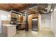 Modern kitchen with stainless steel appliances, exposed ceilings, creating a functional and stylish cooking environment at 170 Boulevard Se # E006, Atlanta, GA 30312