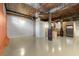Bright living room with hardwood floors, exposed beams, and modern accents at 170 Boulevard Se # E006, Atlanta, GA 30312