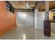 Spacious living room with exposed beams, brick wall, and industrial design elements at 170 Boulevard Se # E006, Atlanta, GA 30312