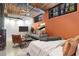 Comfortable living space featuring exposed brick, wooden ceiling, and comfortable seating with relaxing atmosphere at 170 Boulevard Se # E006, Atlanta, GA 30312