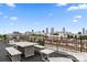Comfortable rooftop deck with ample seating and great city skyline views at 170 Boulevard Se # E006, Atlanta, GA 30312