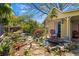 Beautiful backyard with a charming cottage, serene pond, and lush landscaping at 218 Barry St, Decatur, GA 30030