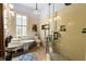 Updated bathroom with double sinks, claw foot tub and a glass shower at 218 Barry St, Decatur, GA 30030