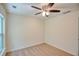 Bedroom featuring neutral carpet, a window, and a ceiling fan at 2241 Nottley Dr # 4, Marietta, GA 30066
