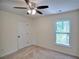 Bedroom featuring neutral carpet, a window with nature views, and a closet at 2241 Nottley Dr # 4, Marietta, GA 30066