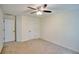Bedroom featuring neutral carpet, two closets, and a ceiling fan at 2241 Nottley Dr # 4, Marietta, GA 30066