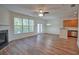 Spacious living room featuring a fireplace, lots of natural light, and hardwood floors at 2241 Nottley Dr # 4, Marietta, GA 30066