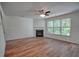 Spacious living room featuring a fireplace, lots of natural light, and hardwood floors at 2241 Nottley Dr # 4, Marietta, GA 30066