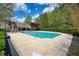 Spacious community pool surrounded by green foliage and offering a refreshing escape at 2241 Nottley Dr # 4, Marietta, GA 30066
