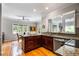 Well-appointed kitchen with granite counters, stainless appliances, and hardwood floors at 3188 Paces Mill Se Rd, Atlanta, GA 30339