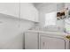 Clean and functional laundry room with modern washer and dryer units at 3188 Paces Mill Se Rd, Atlanta, GA 30339