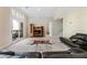 Spacious living room with plush carpet, sliding glass doors, and modern entertainment center at 3188 Paces Mill Se Rd, Atlanta, GA 30339