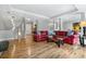Expansive living area with gleaming hardwood floors, tray ceilings, and neutral decor at 3188 Paces Mill Se Rd, Atlanta, GA 30339