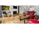 Spacious living room with a cozy fireplace, hardwood floors, and an open layout at 3188 Paces Mill Se Rd, Atlanta, GA 30339
